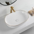 Chậu Lavabo Oval Đặt Bàn Sứ Trắng Viền Vàng Cao Cấp Navier NV-341